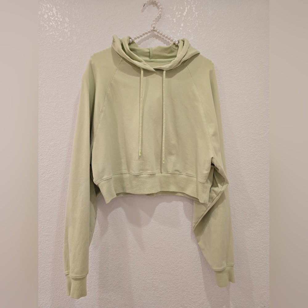 Alo Yoga Cropped Double Take French Terry Hoodie in the color Iced Green Tea - Picture 3 of 7